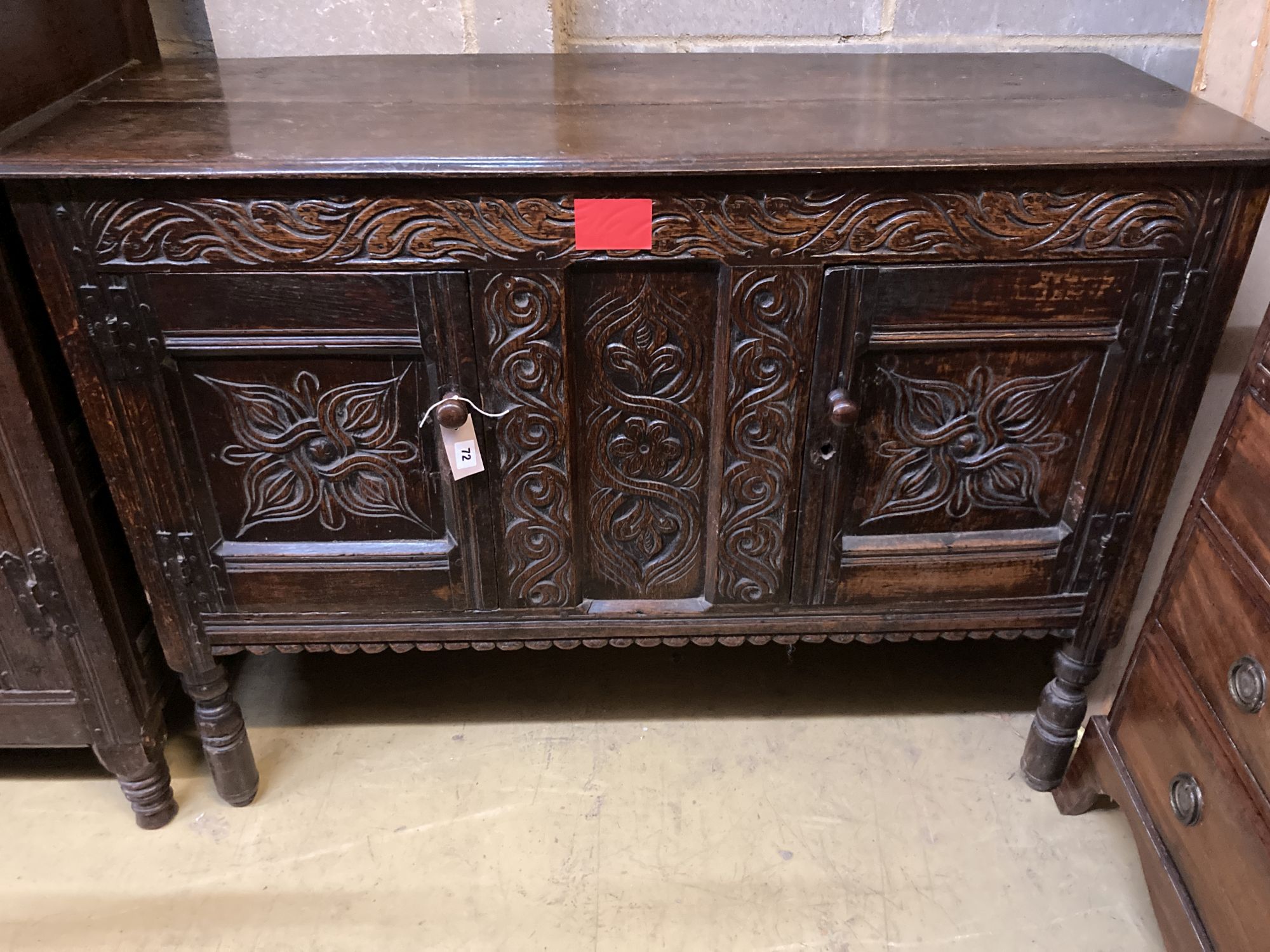 A 17th century and later oak two door cabinet, width 126cm, depth 46cm, height 94cm